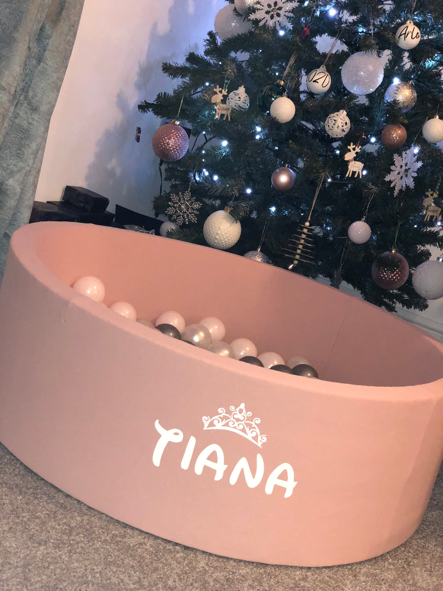 Personalised Ball Pit. Our ball pits come in grey or pink and include 200 balls as well as a bag that is also personalised to match the ball pit, the perfect gift for a child's nursery. 